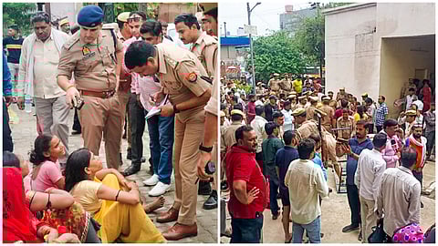 Police personnel outside a hospital where victims of the Hathras' stampede are admitted, in Etah